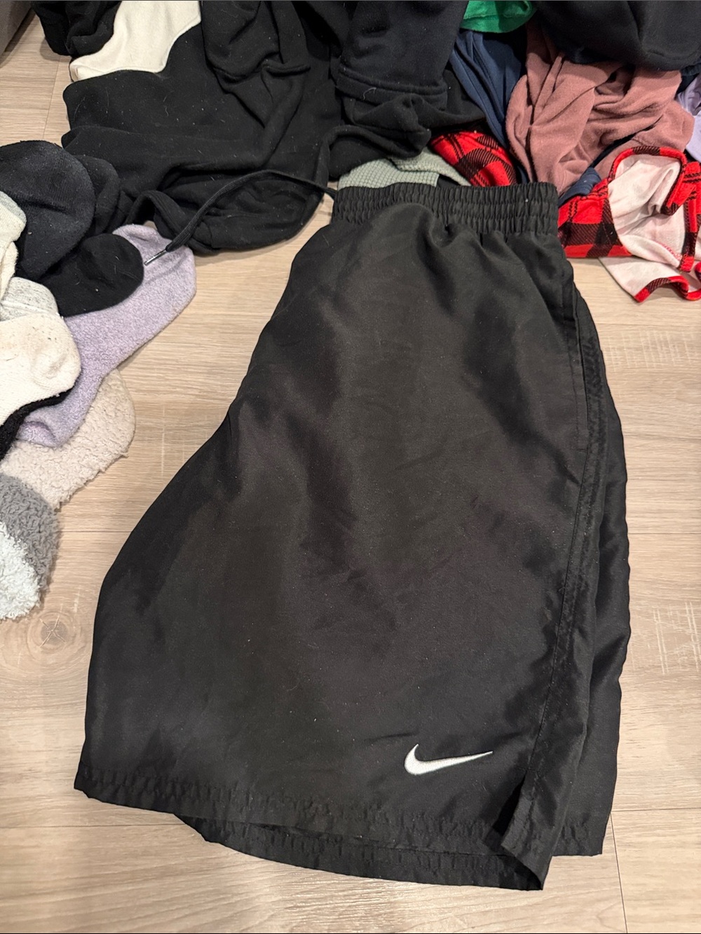 Nike Black men’s Athletic Shorts with White Swoosh
